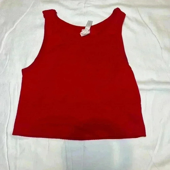 I’m selling a red Nikibiki crop top. - Picture 1 of 4